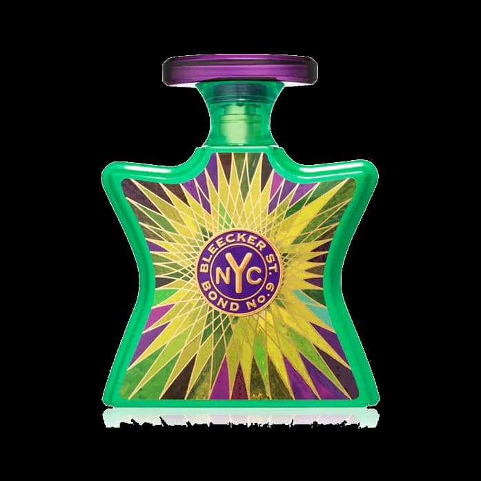 Frasco de talle estrecho en vidrio verde con una estrella amarilla y violeta estampada, medallón circular azul al centro y tapa violeta, sobre fondo blanco.
