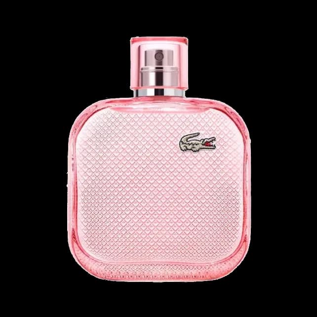 Frasco cuadrado de esquinas redondeadas en vidrio rosa con textura de rombos en relieve, tapa rosa y cocodrilo bordado, sobre fondo blanco.