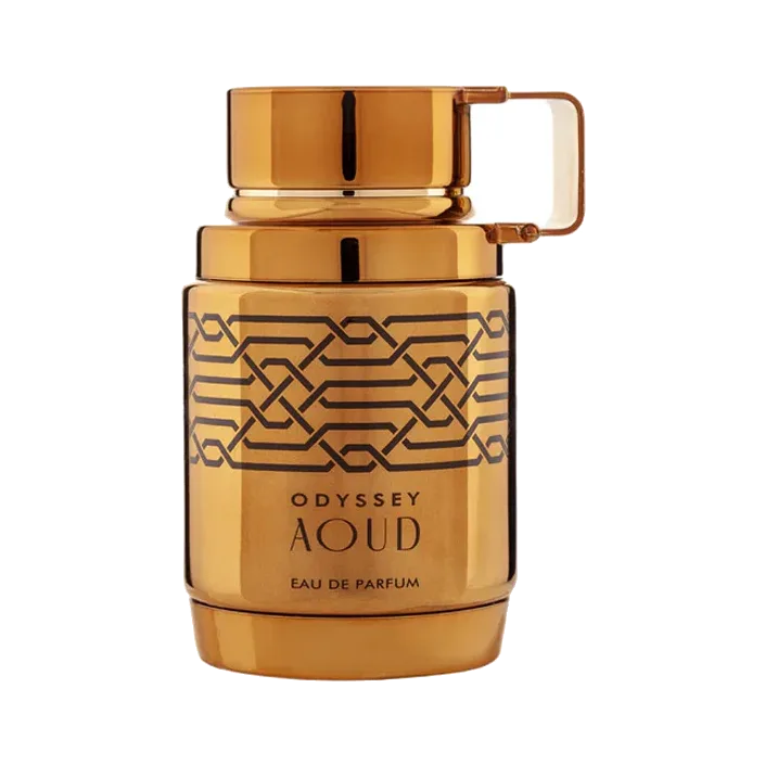 Frasco cilíndrico dorado con un entramado de nudos grabado en negro y tapa con asa rectangular, sobre fondo blanco.