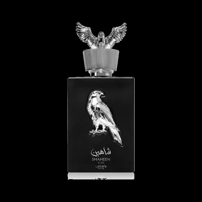 Frasco rectangular negro mate con un halcón plateado en relieve en el frente y un águila plateada con alas abiertas como tapón, sobre fondo blanco.
