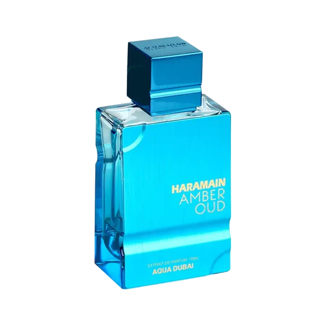 Frasco rectangular de vidrio azul turquesa metalizado con una franja transparente en el canto y tapón cúbico a juego, en tres cuartos sobre fondo blanco.