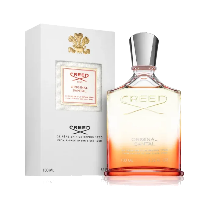 El frasco junto a su estuche blanco texturado con un escudo dorado y etiqueta enmarcada, ambos sobre fondo blanco.