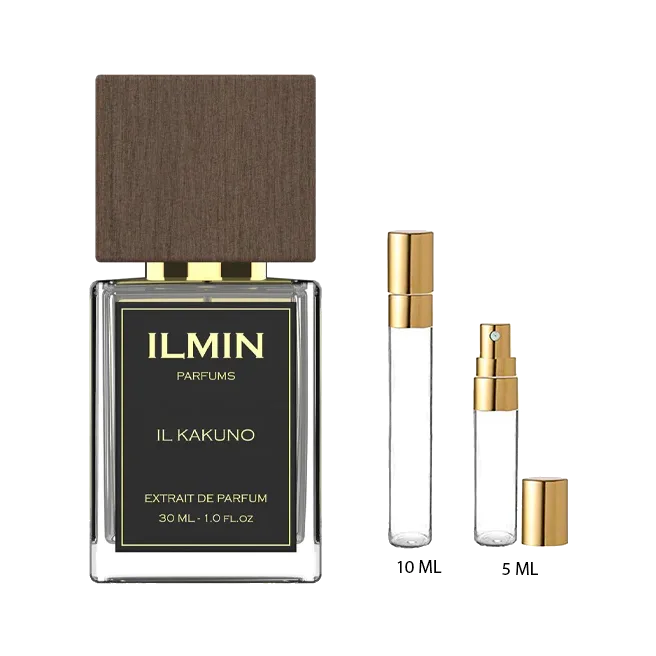 El frasco junto a dos atomizadores vacíos de vidrio con tapa dorada, rotulados 10 ML y 5 ML, sobre fondo blanco.